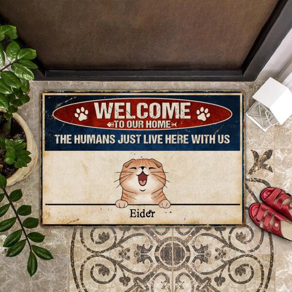 Welcome To Our Home - The Humans Just Live Here With Us - Personalized Custom Cat Doormat